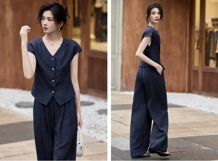 A study of motion and fluid silhouettes in the L'Oiseau Bleu pleated set, capturing the effortless grace of the modern woman — From Borcelleclothes.
