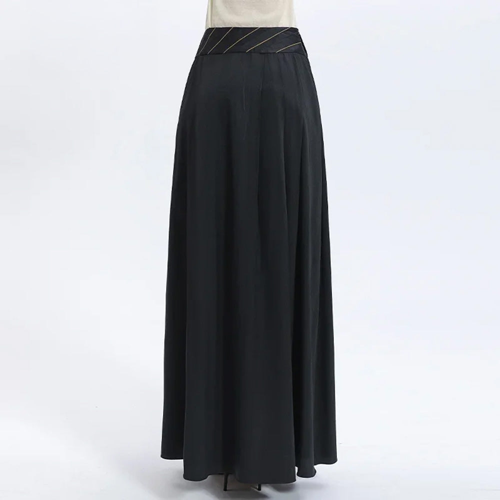 Close-up back view of the luxury Mulberry silk skirt on a model, highlighting the clean fit and premium tailoring — From Borcelleclothes.