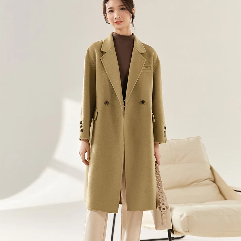 Women's double-sided wool coat in Do-Re-Mi color, featuring notch lapels, dropped shoulders, and a seamless, fluid silhouette. — From Borcelleclothes.