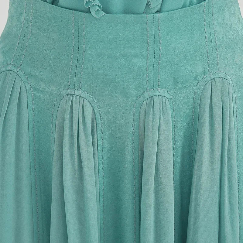 Close-up of the front waist section, showcasing the distinct raised bundle-stitch embroidery along the elegant jacquard arches — From Borcelleclothes.