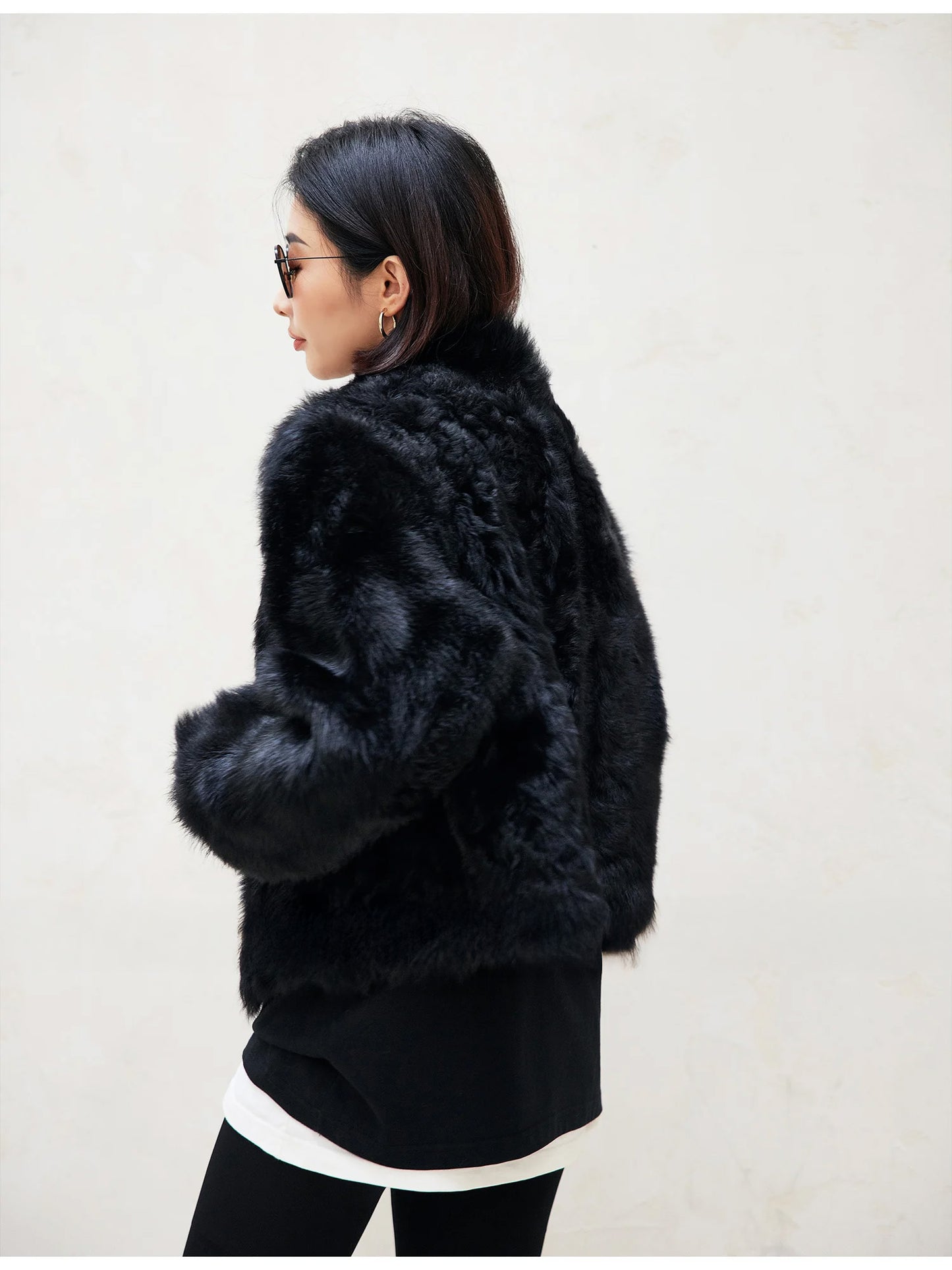 Back view of the Autographe shearling jacket, fur side shown with visible texture and volume — From Borcelleclothes.
