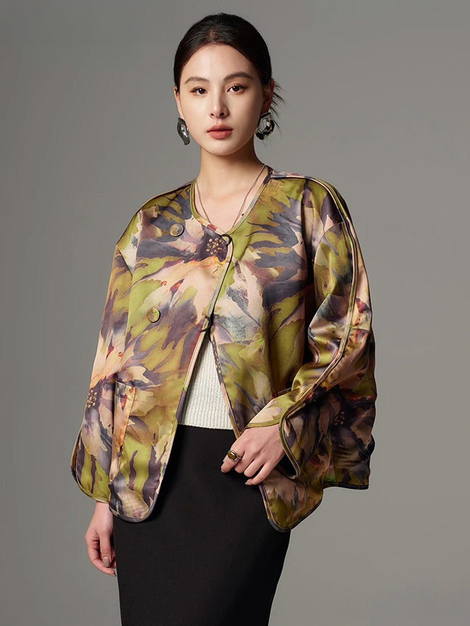 Model wearing the Autumn Kiku watercolor print side fastened at the upper covered button — From Borcelleclothes.