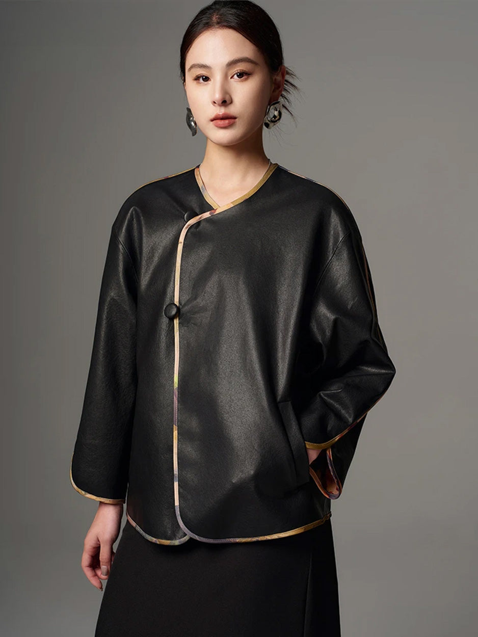Model resting hand in the single-welt side pocket of the black Nappa leather jacket — From Borcelleclothes.