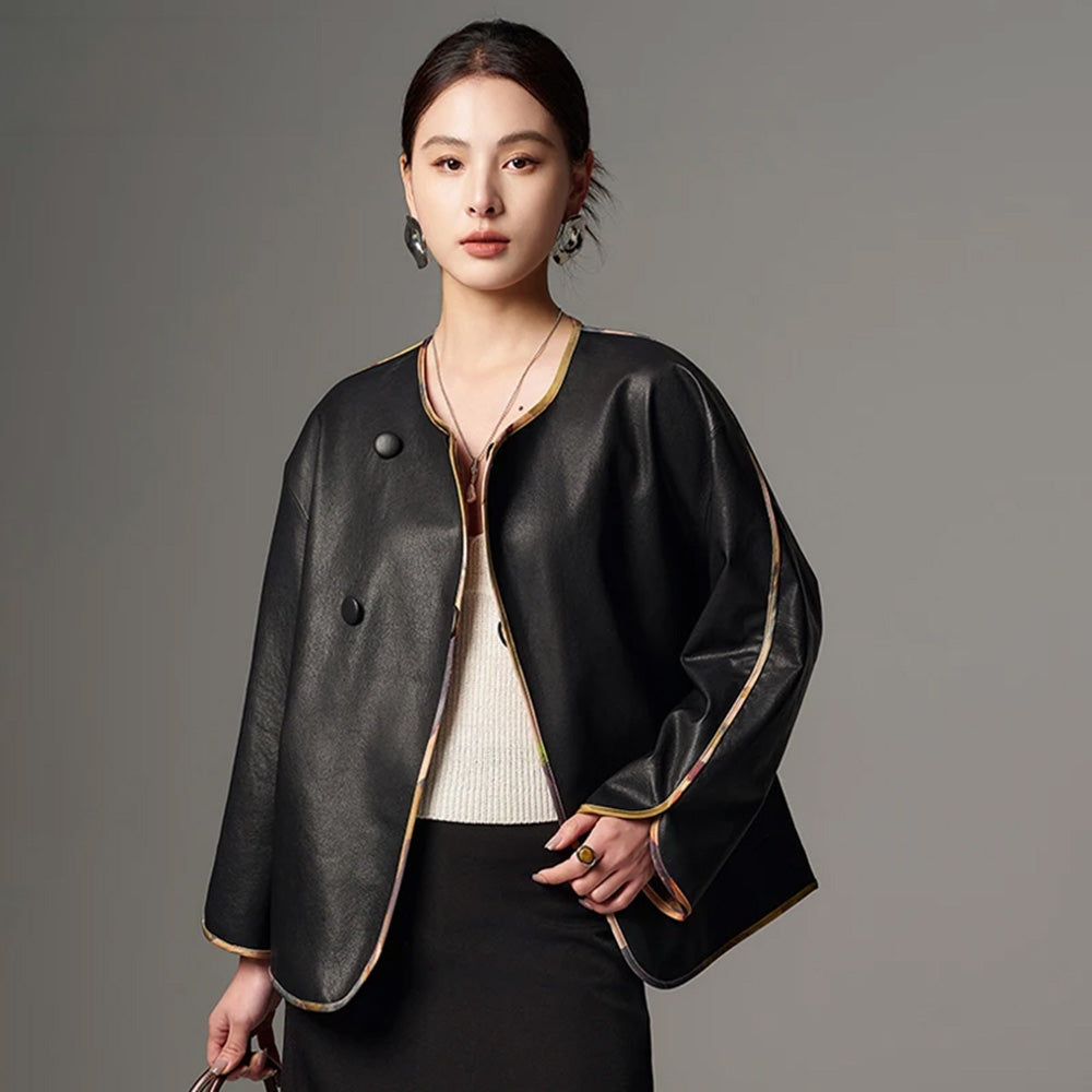 Women's Reversible Nappa Sheepskin jacket featuring a sumi-e inspired watercolor print, fluid kimono sleeves, bound edges, and an asymmetric crossover front. — From Borcelleclothes.