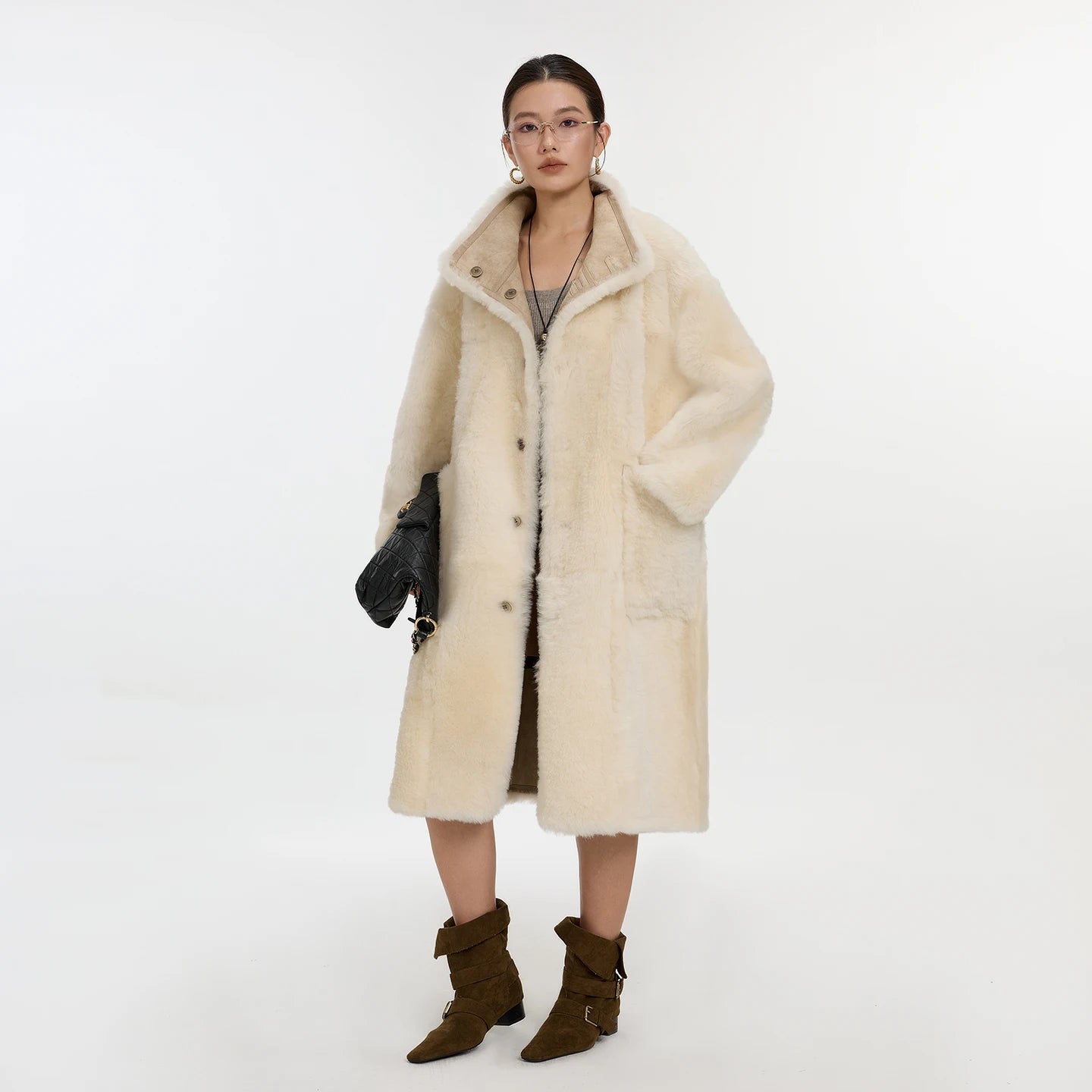 Women’s reversible shearling coat in Oatmeal Wax color, featuring glossy leather trims and mid-calf silhouette — From Borcelleclothes.