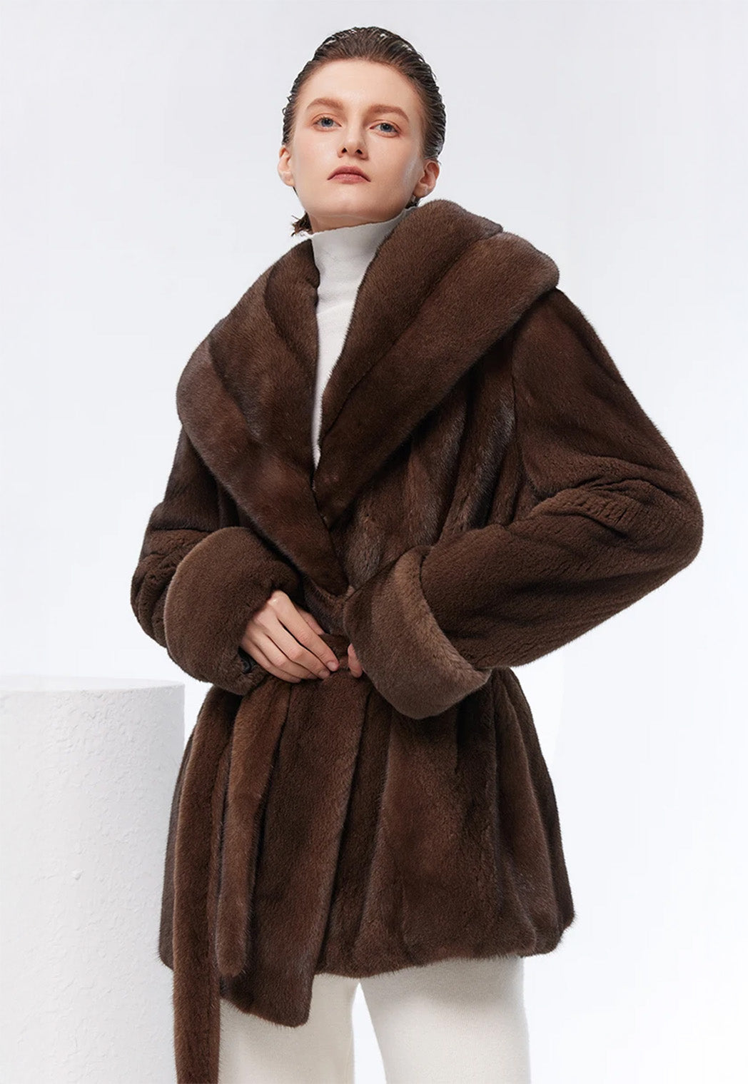 Model adjusting belt of Eclipse sheared mink coat with turned-back cuffs — From Borcelleclothes.
