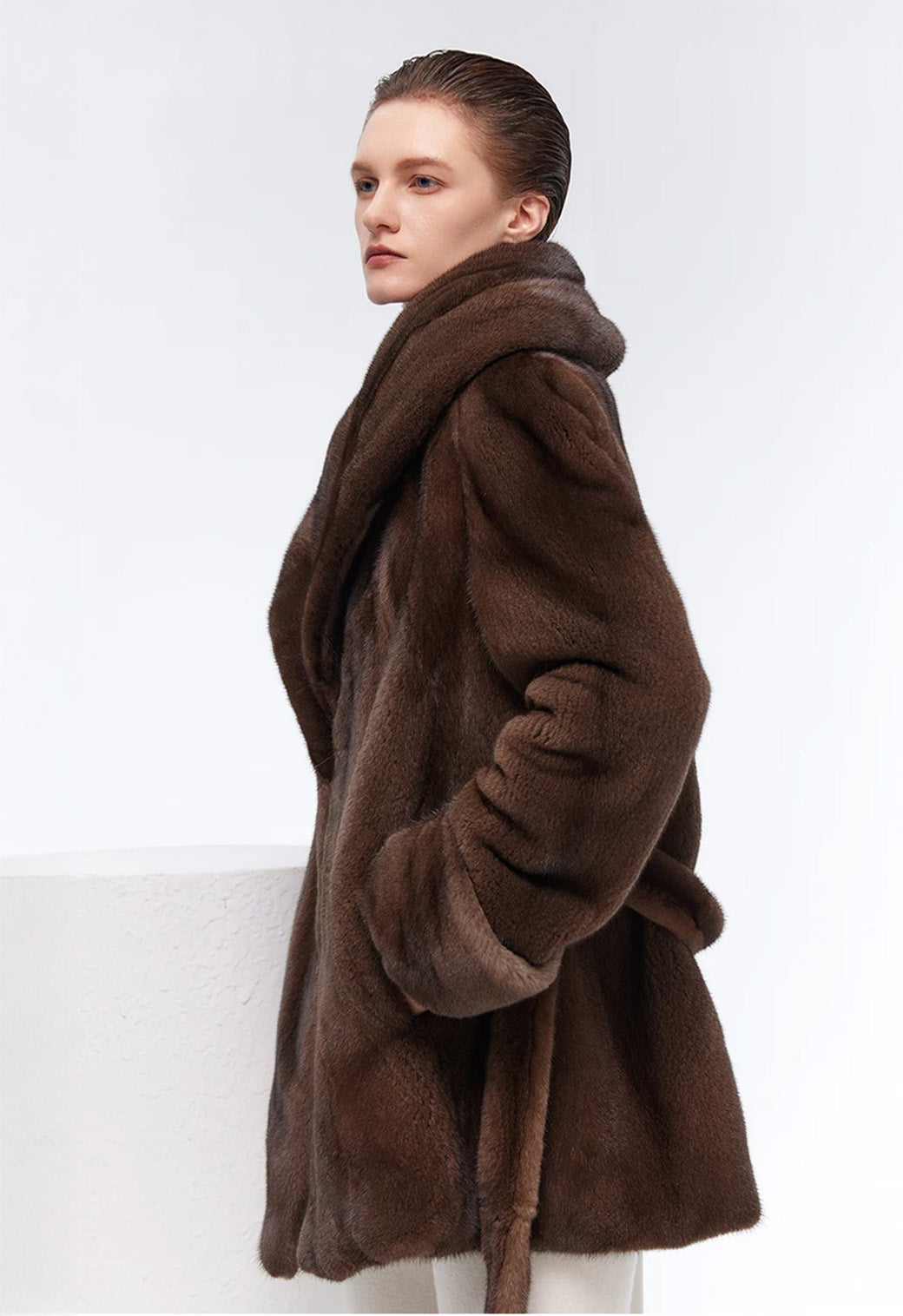 Side pose of model in Eclipse sheared mink coat with sculpted collar — From Borcelleclothes.