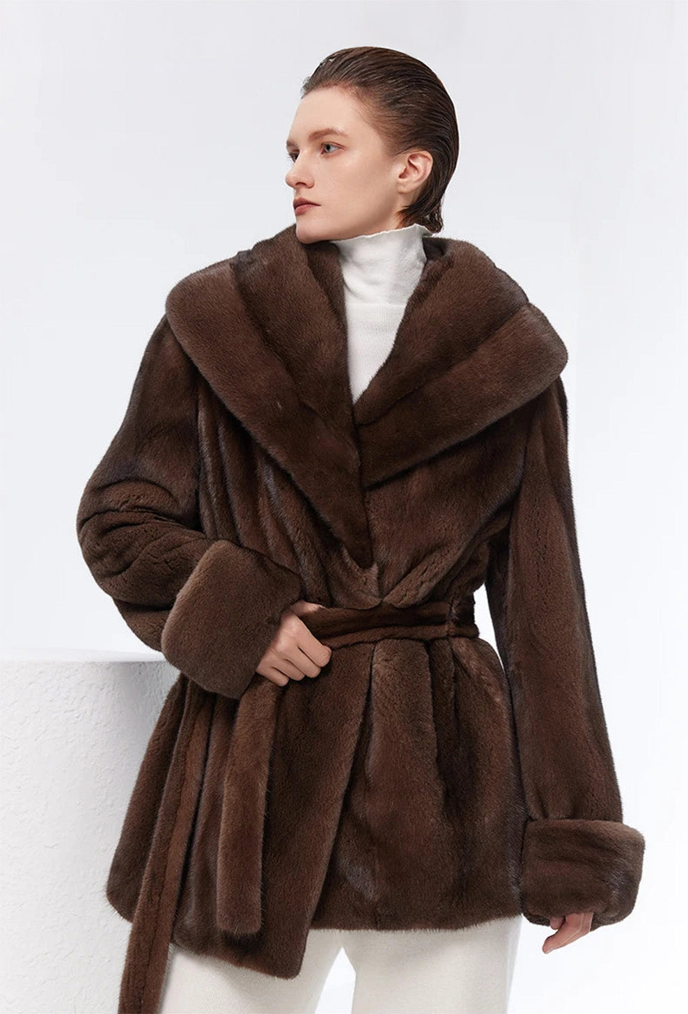 Women's sheared mink coat with wide shawl collar and self-tie belt, shown in Eclipse. — From Borcelleclothes.