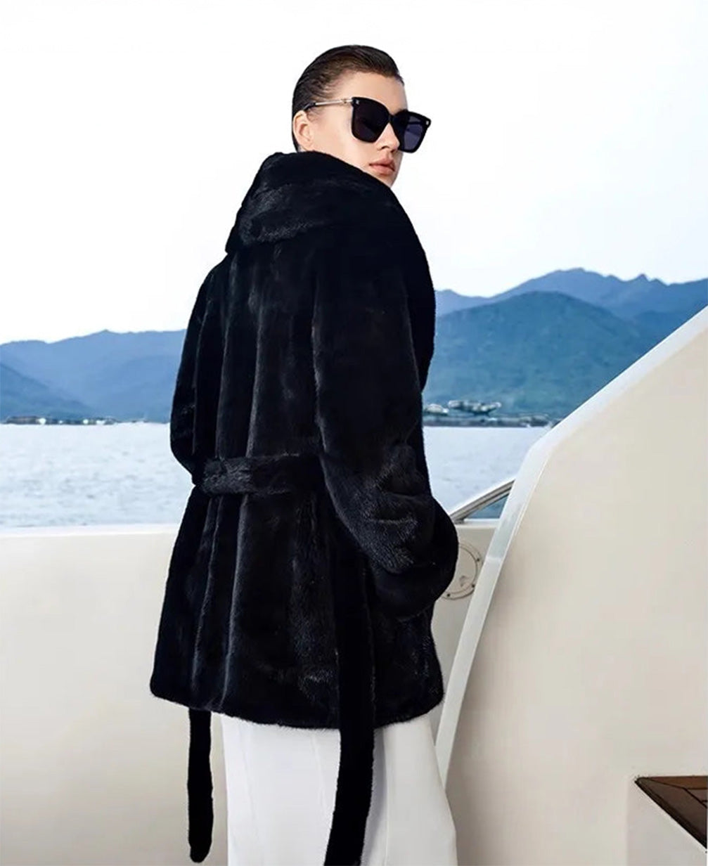 Women's sheared mink coat with wide shawl collar and self-tie belt, shown in Onyx. — From Borcelleclothes.