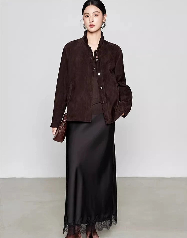 Front perspective of the Comfortable Wenge sheepskin suede jacket styled with a tonal brown leather bag — From Borcelleclothes.