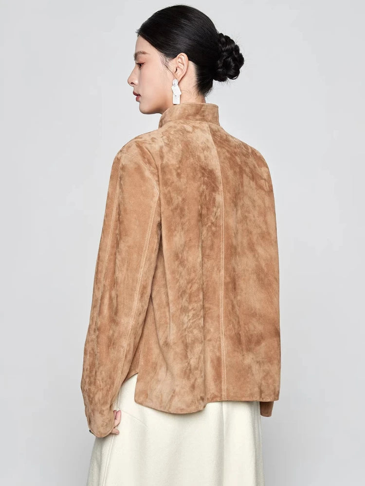 Rear view of the sheepskin suede jacket in Moiré Trace, showing a draping silhouette and and side slits — From Borcelleclothes.