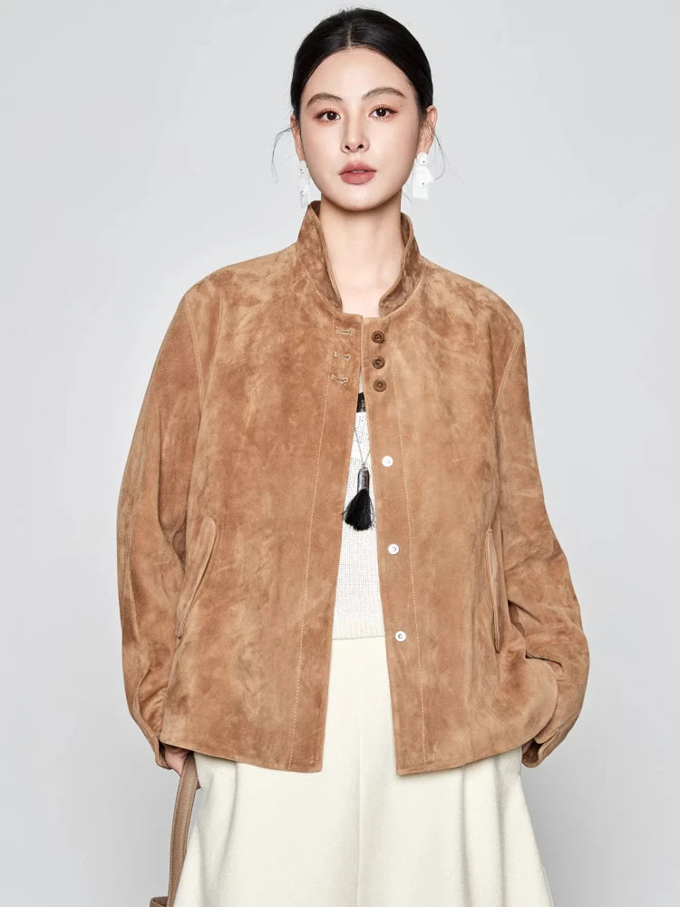 Front view of an unfastened sheepskin suede jacket in Moiré Trace with a mandarin collar, worn by a model looking at the camera — From Borcelleclothes.