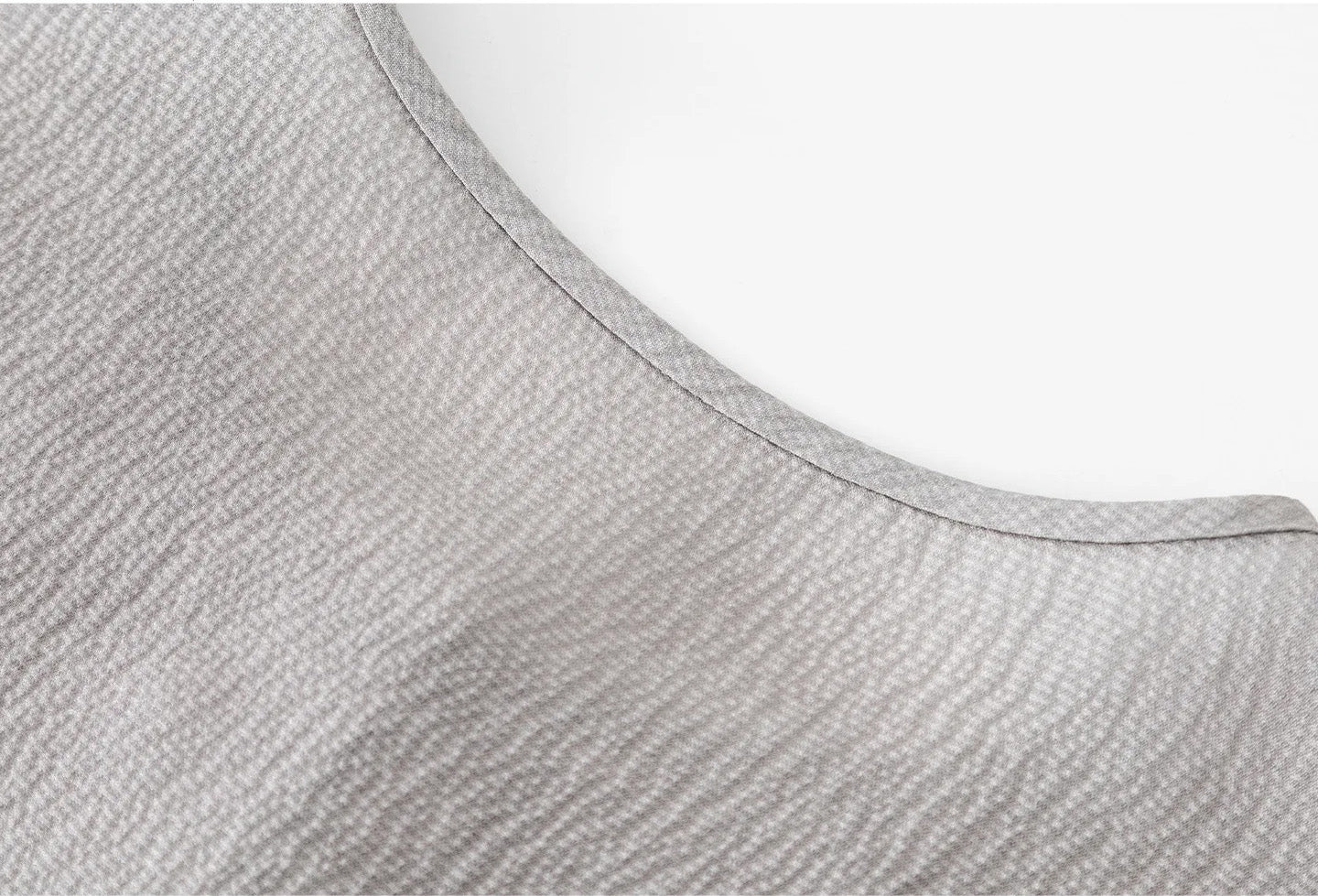 Back neckline detail of the Where Lives Nacre silk georgette blouse showing shoulder construction. — From Borcelleclothes.