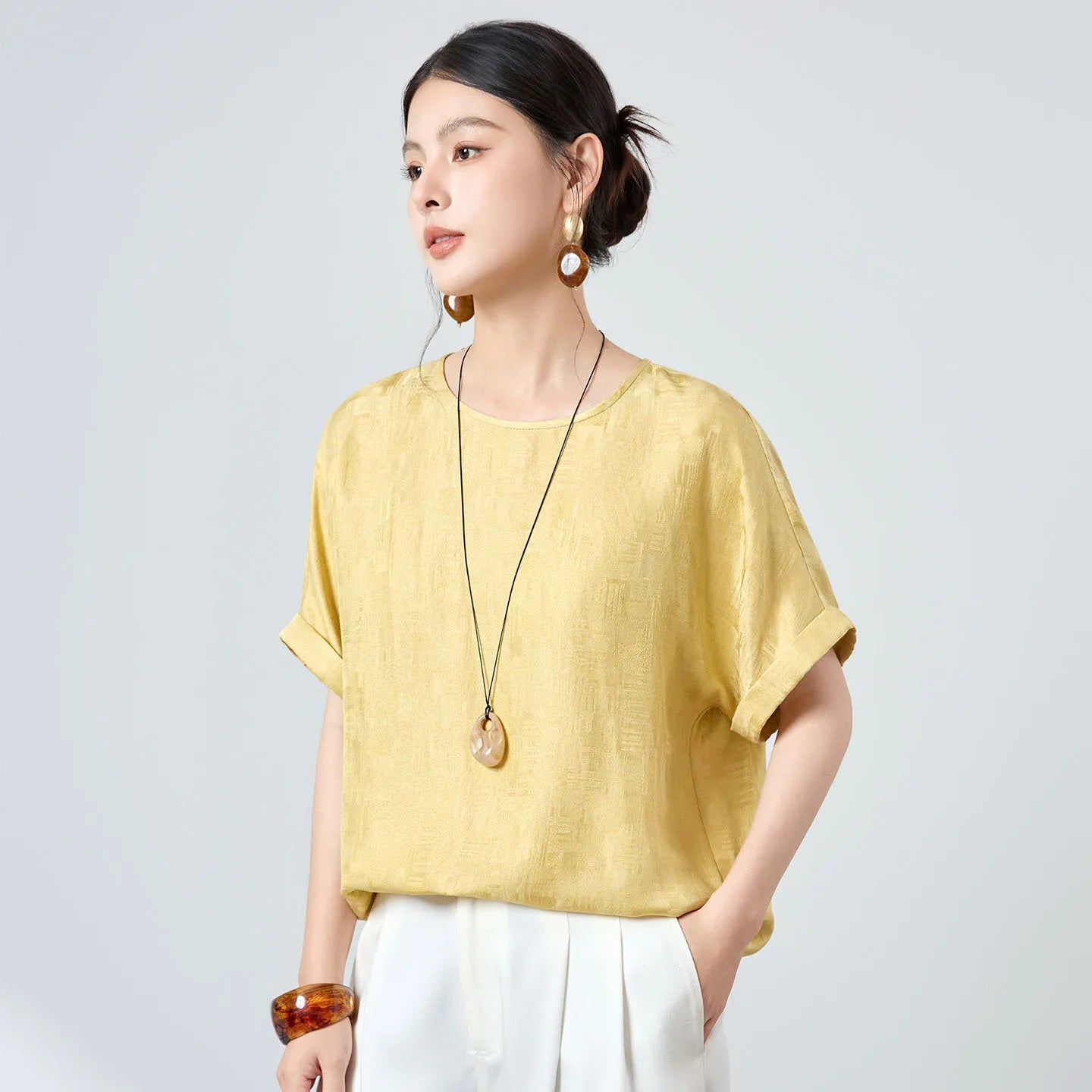 Women's 19 momme Mulberry silk Sangbo jacquard blouse with light-reflective flecks in Hakea. Features short kimono sleeves, turned-back cuffs, and a cat's-eye button closure. — Froom Borcelleclothes.