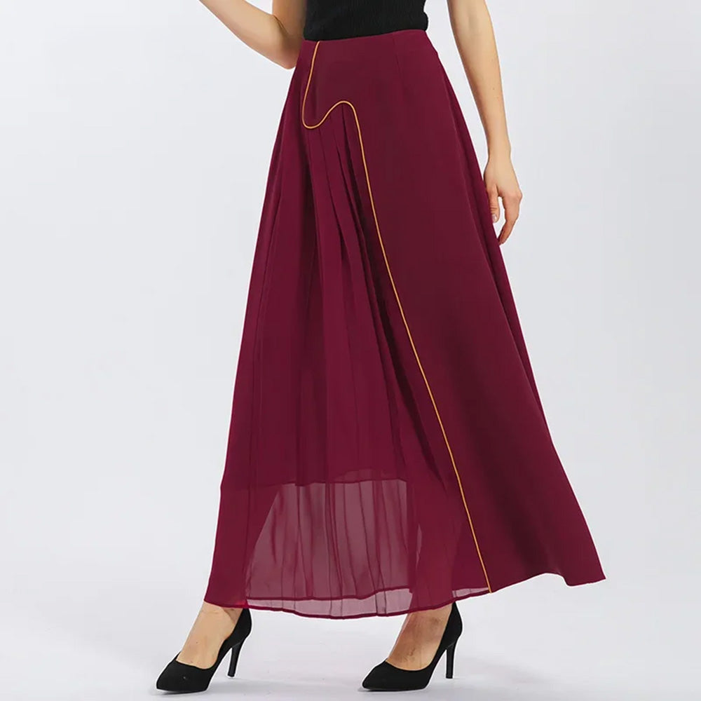 Women's Asymmetric Mulberry silk maxi skirt in Carat Garnet, structured with heavyweight 40 Momme crepe and fluid pleated georgette, accented by contrast gold piping. — From Borcelleclothes.