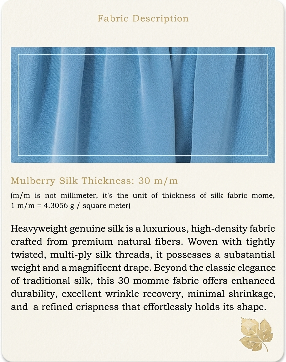 Close-up texture shot of the heavyweight, 30 momme Mulberry silk fabric in 'Wandering River' sky blue, displayed in soft, wave-like folded drapes to emphasize its matte finish and luxurious weight. — From Borcelleclothes.