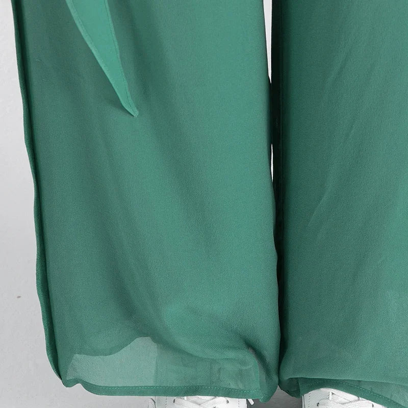 Close-up of the floor-length bottom hems showcasing the sheer double-layered silk georgette structure — From Borcelleclothes.