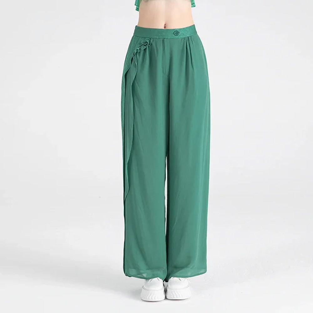 Women's Double-layered Grade 6A Mulberry silk georgette trousers featuring an asymmetrical jacquard overlay, fluid ruffle ribbon, and a serene Calm Jade hue.  — From Borcelleclothes.
