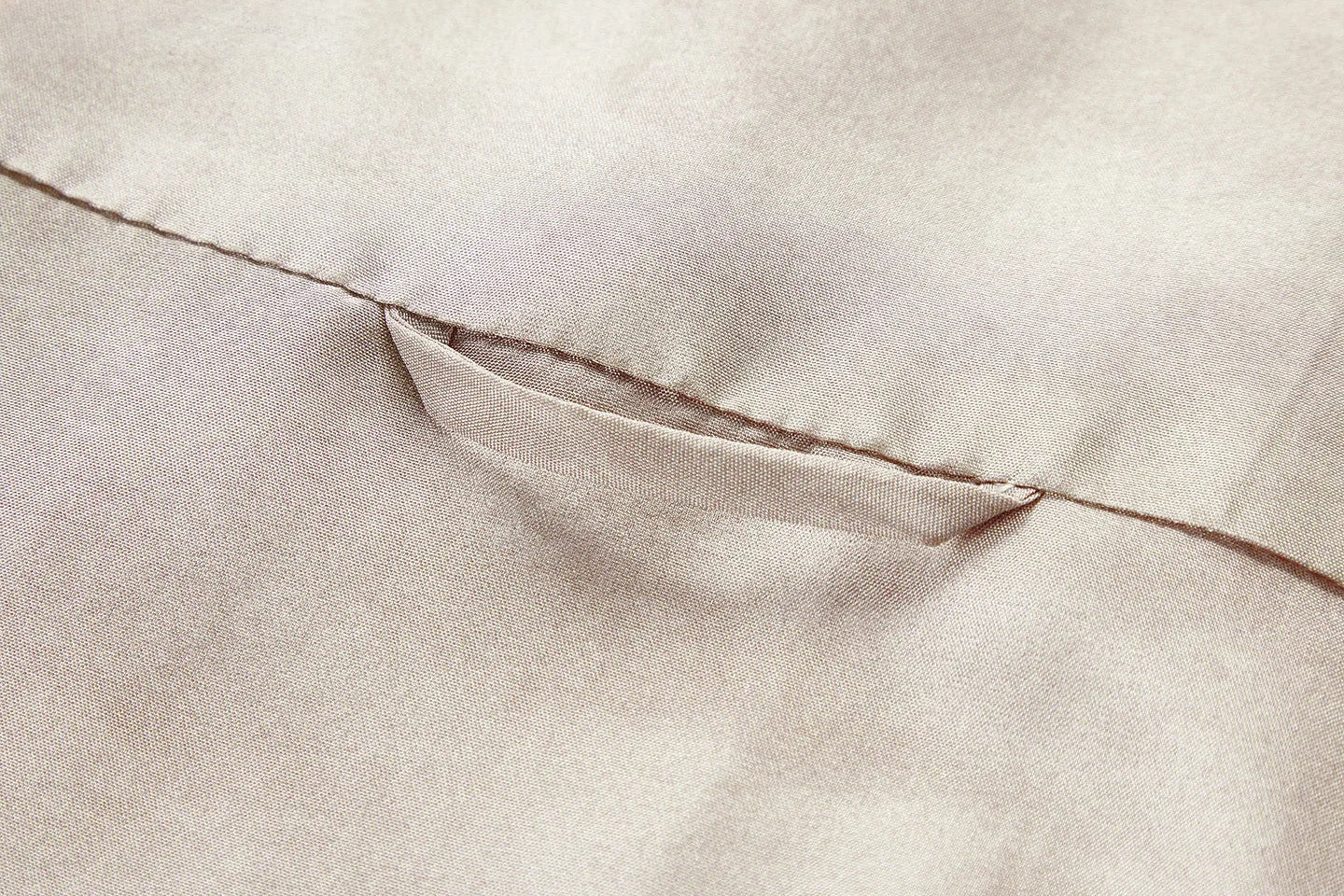 Close-up view of the back yoke and decorative central loop on the Mulberry silk jacket in Whispering Wind — From Borcelleclothes.