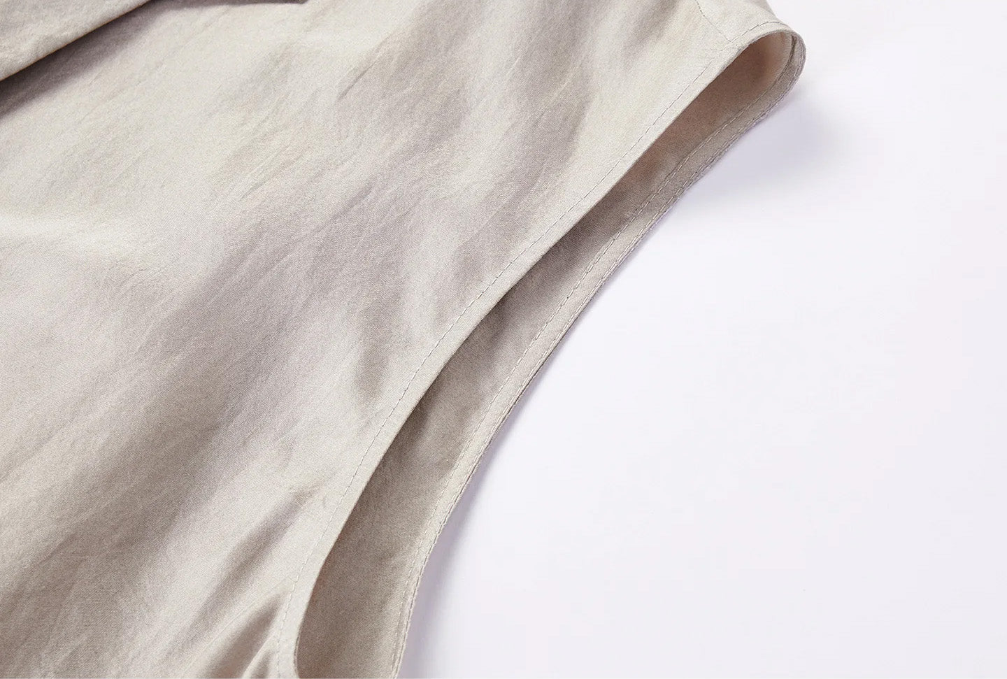 Tailoring detail of finished sleeveless armhole and layered side drape on Morning Draft silk blouse — From Borcelleclothes.