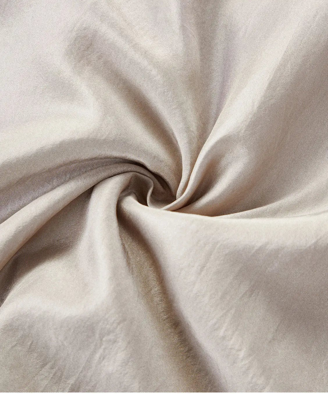 Macro detail of lightweight Morning Draft Mulberry silk Habotai fabric folded in an artistic spiral — From Borcelleclothes.