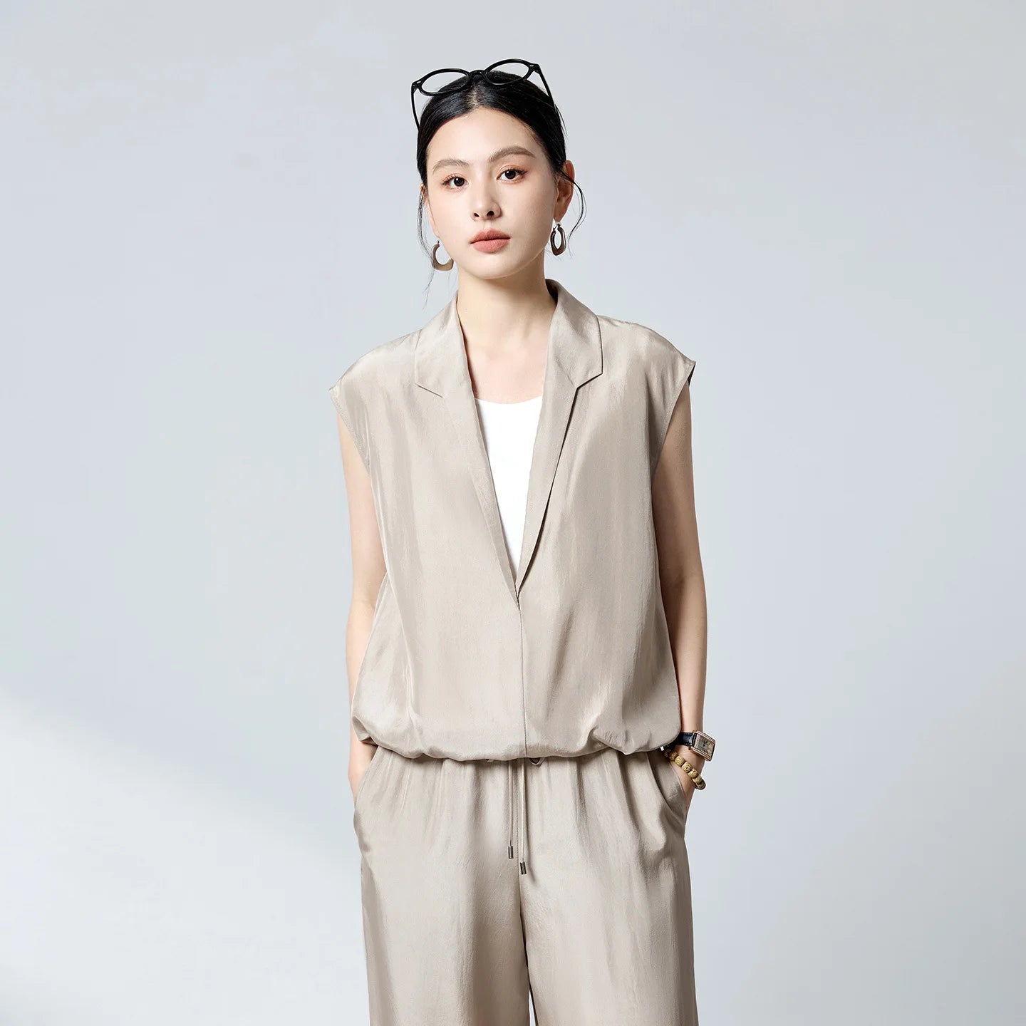 Women's Habotai Mulberry silk blouse in Morning Draft. Featuring an elongated stepped shawl collar and a white tank top, joined at the elasticated hem. — From Borcelleclothes.