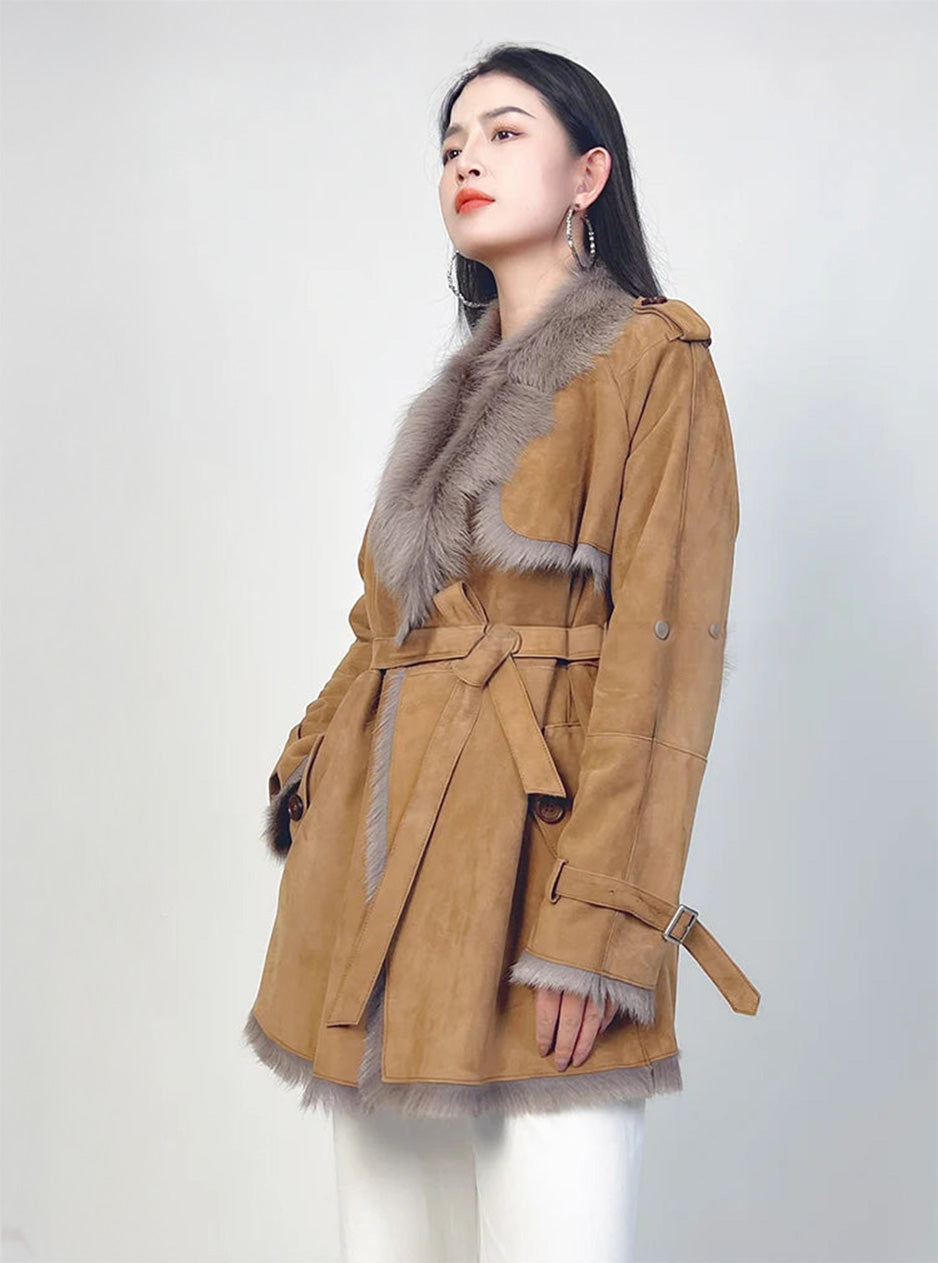 Model in goatskin coat with one hand in flap pocket — From Borcelleclothes.