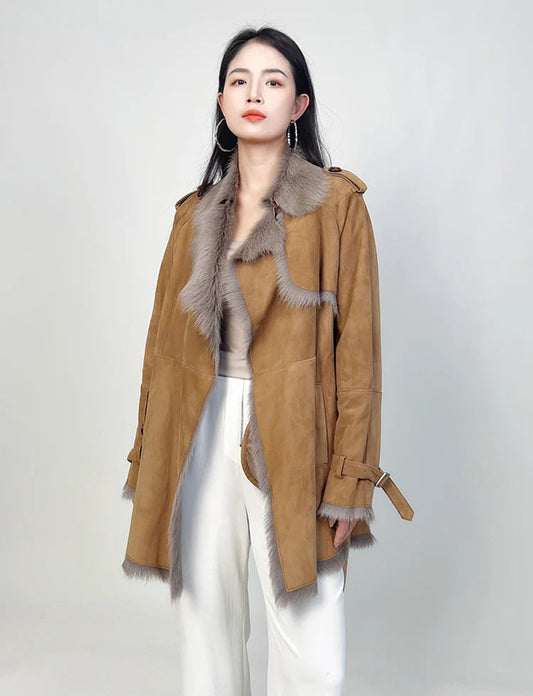 Woman standing straight in a goatskin coat with storm flap and notch lapels — From Borcelleclothes.