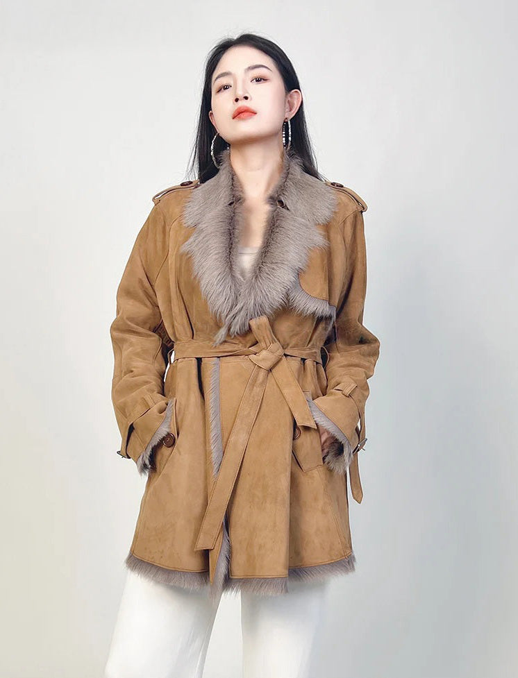 Women's double-faced goatskin coat in Gold Ransom, with a storm flap, notch lapels, and self-tied belt. — From Borcelleclothes.
