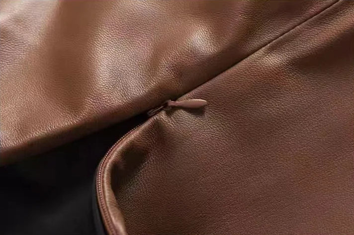 Detailed shot of the unzipped central back invisible zipper on a sheepskin skirt in Bay Grace — From Borcelleclothes.