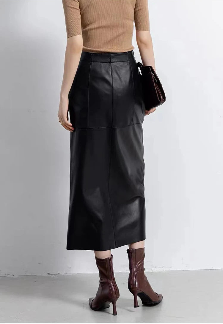 Back view of a model wearing a women's straight sheepskin midi skirt with an invisible zipper in Dark Horse — From Borcelleclothes.