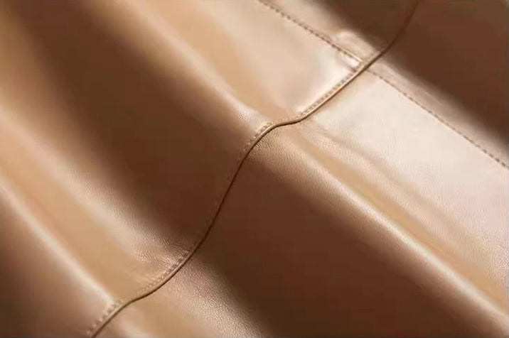 Soft wave-folded leather texture of the genuine sheepskin skirt in Palomino — From Borcelleclothes.