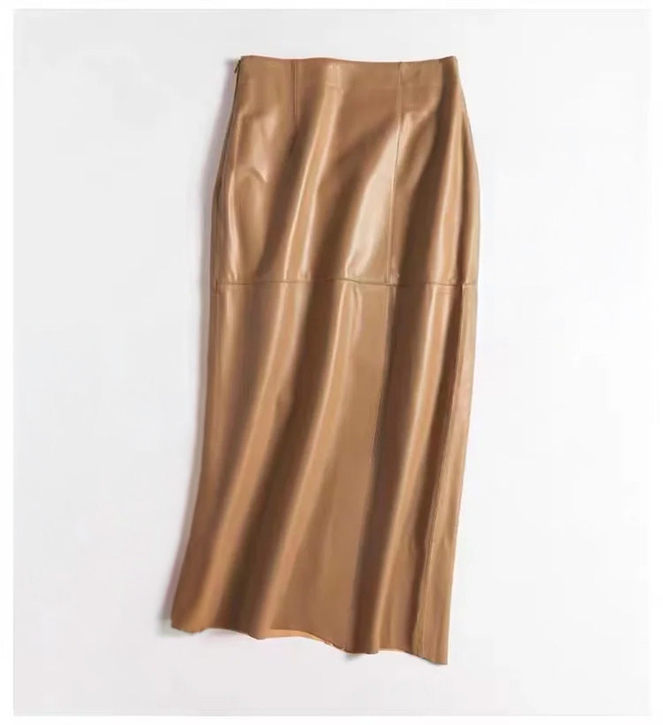 Women's straight silhouette, genuine sheepskin midi skirt in Palomino, featuring an asymmetric front slit and invisible back zipper.  — From Borcelleclothes.