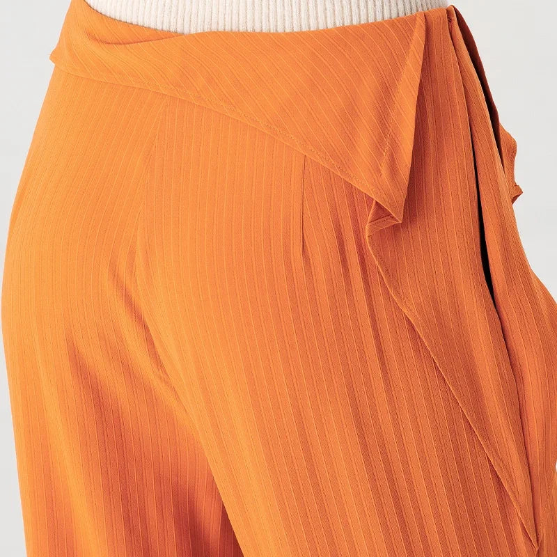Close-up back waist detail of Fragrant Cloud Mulberry silk trousers showing subtle shaping darts and vertical striped texture — From Borcelleclothes.
