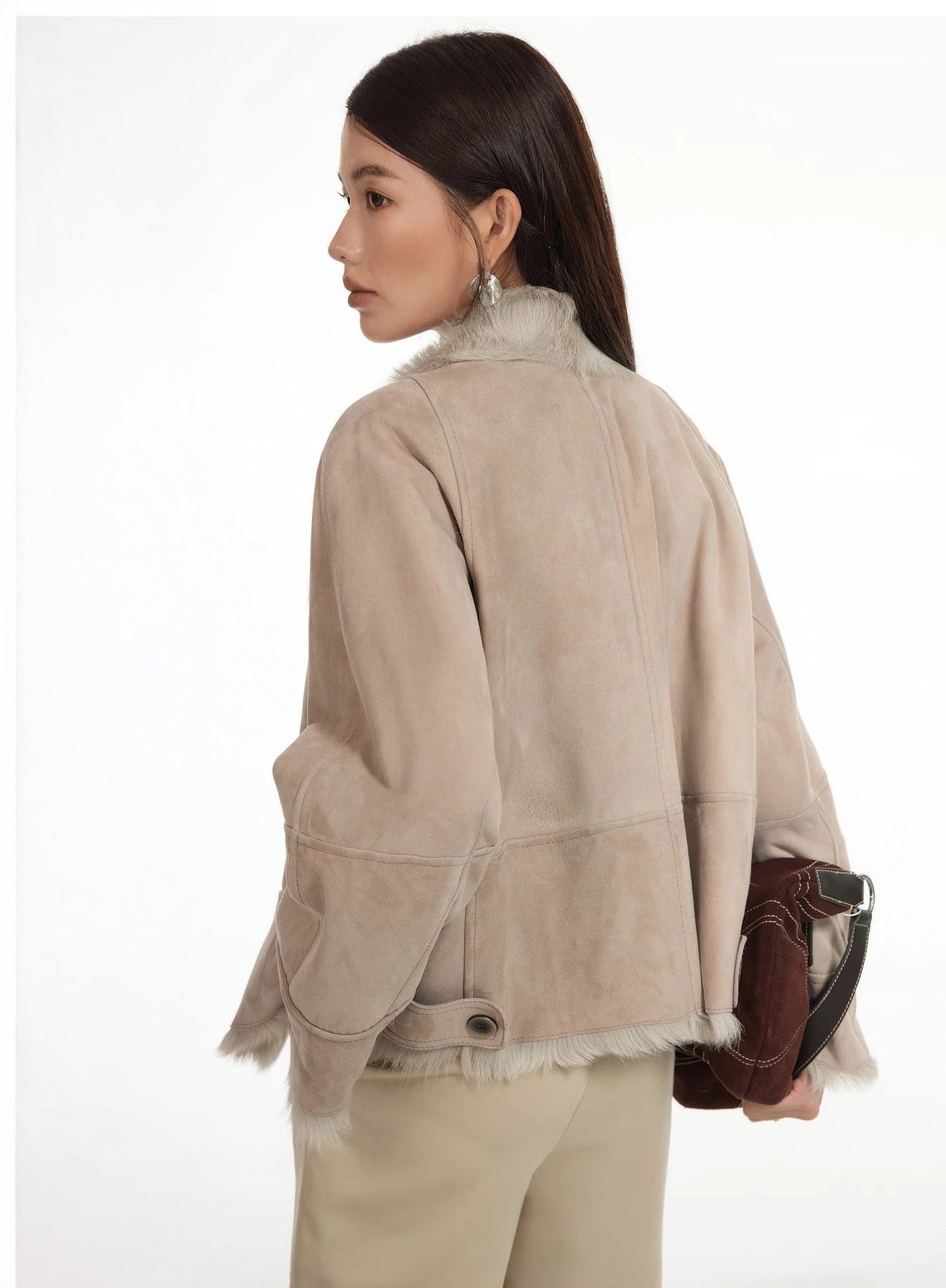 Back view of suede-faced goatskin jacket in Fond Memory, showing soft structure and seam — From Borcelleclothes.