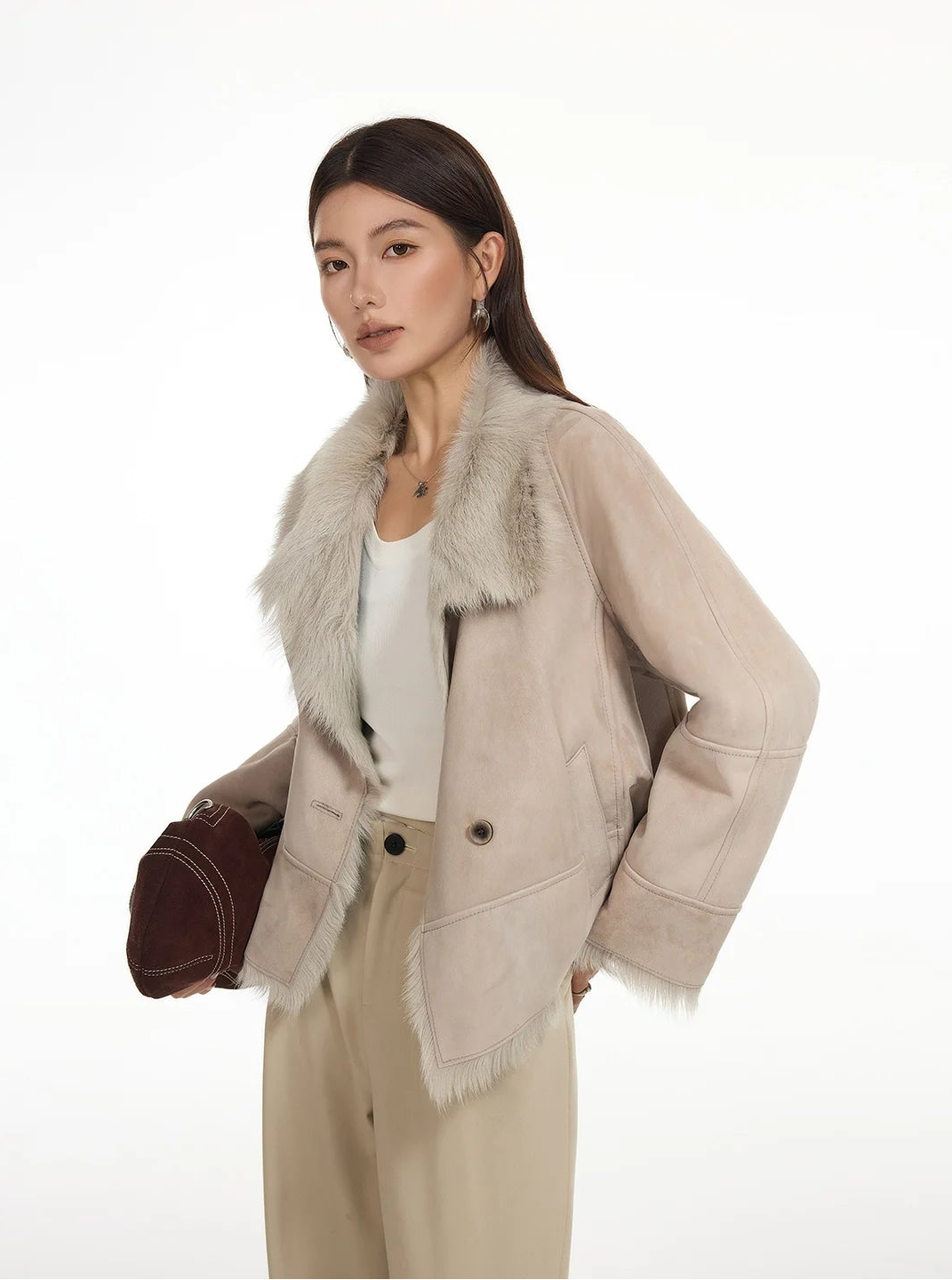 Woman slightly turned to the side in suede-faced goatskin jacket in Fond Memory — From Borcelleclothes.