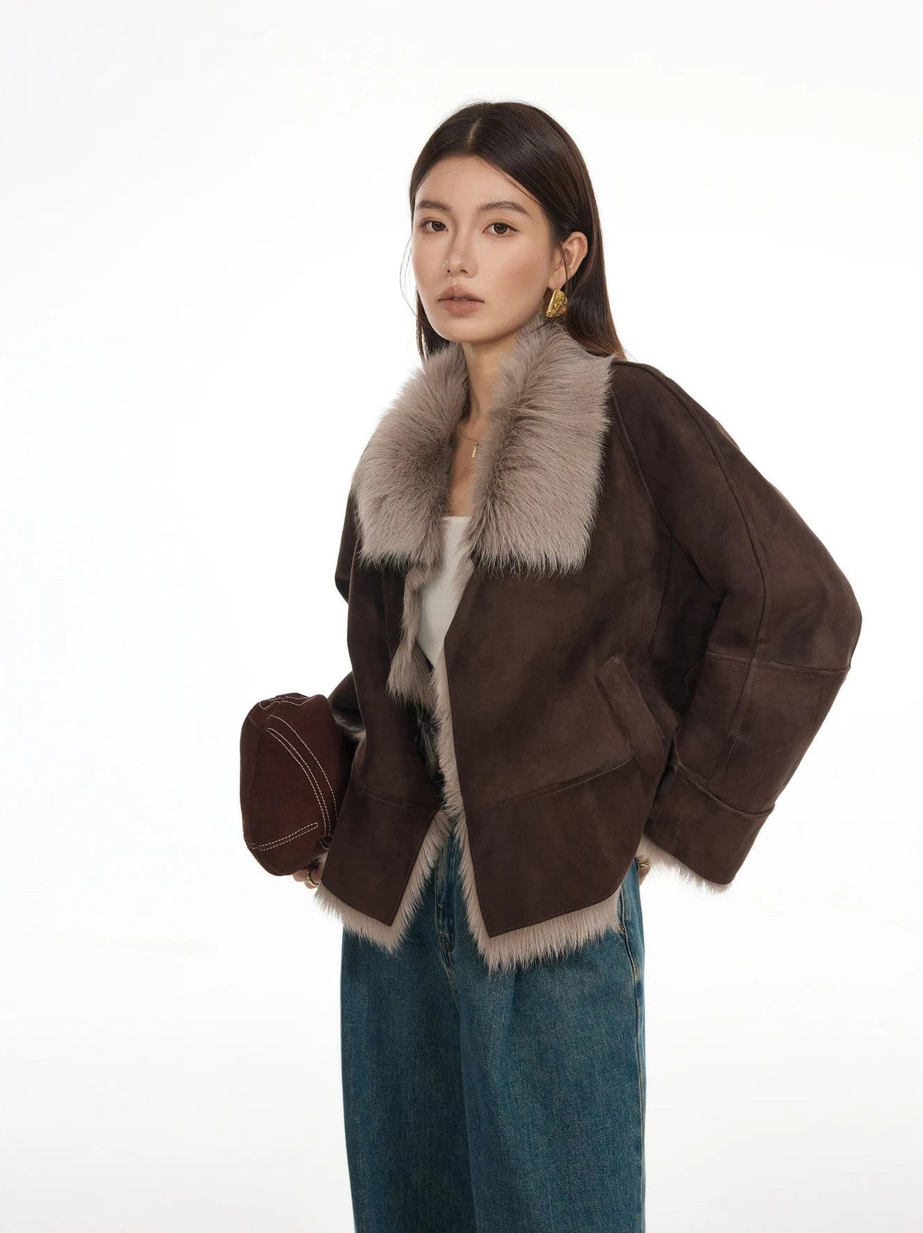 Suede-faced goatskin jacket in Toorak, model turned slightly to the side — From Borcelleclothes.