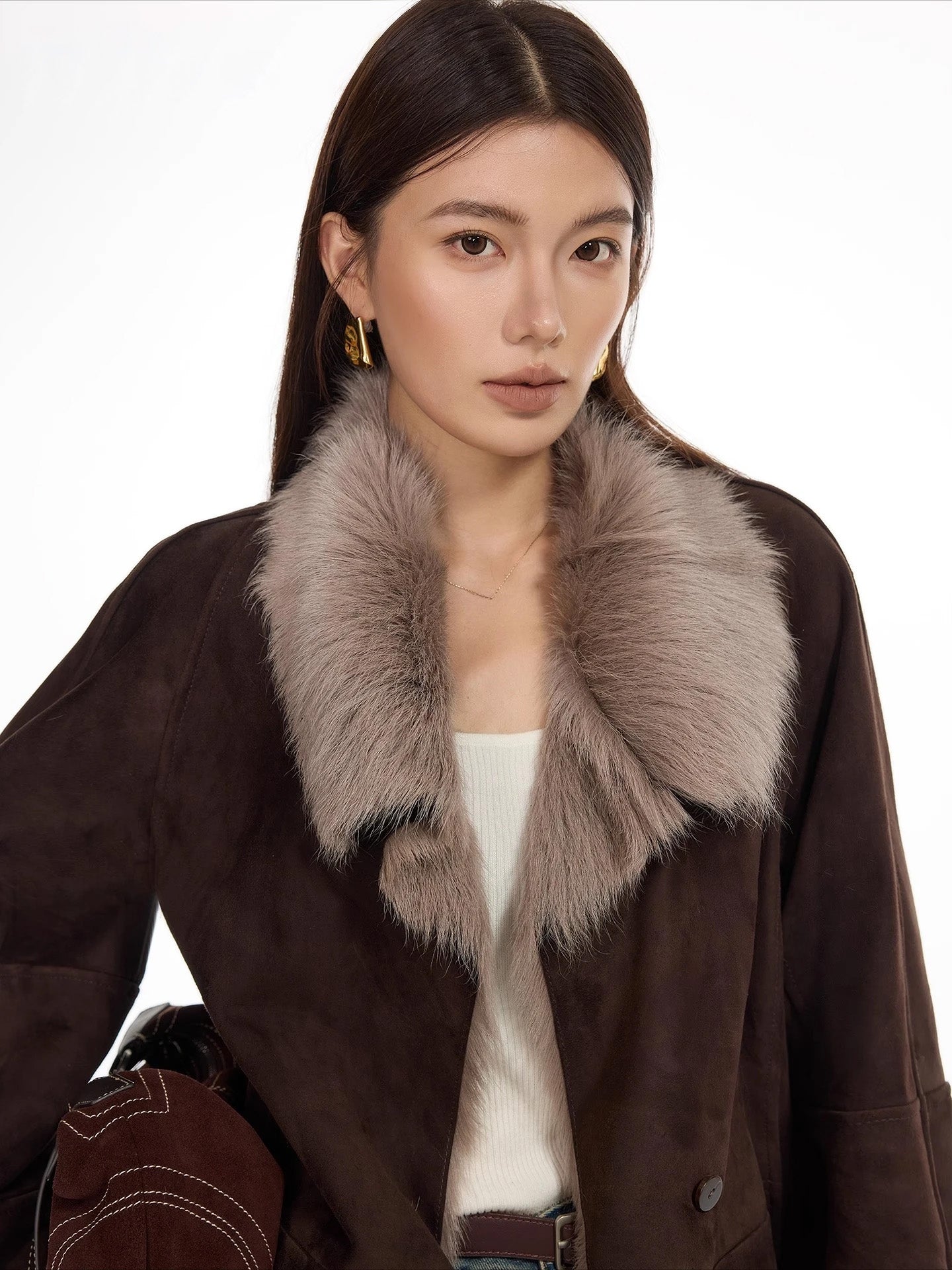 Upper part of suede-faced goatskin jacket in Toorak, worn open by model — From Borcelleclothes.