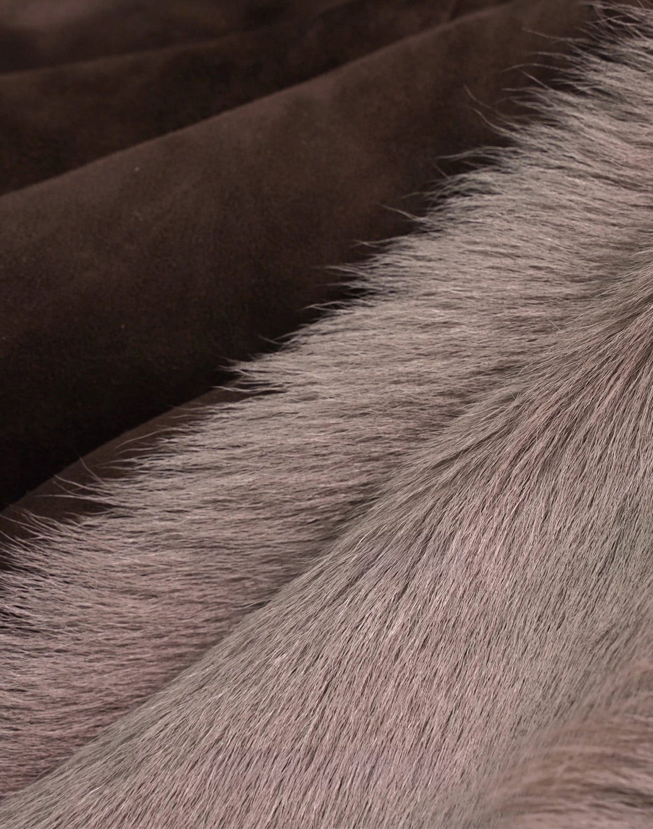 Detail of suede-faced goatskin jacket in Toorak with softly folded fur and suede textures — From Borcelleclothes.