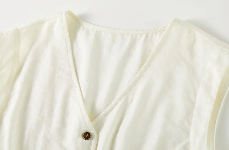 The upper section of the Sydney Breeze vest, showing the clean finish of the extended shoulder line — From Borcelleclothes.