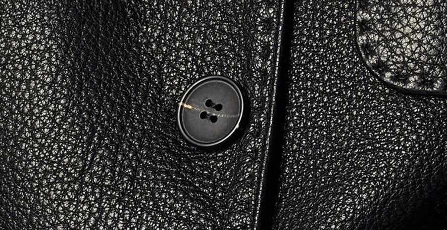 Close-up of the tonal matching button and tailored buttonhole along the front placket — From Borcelleclothes.