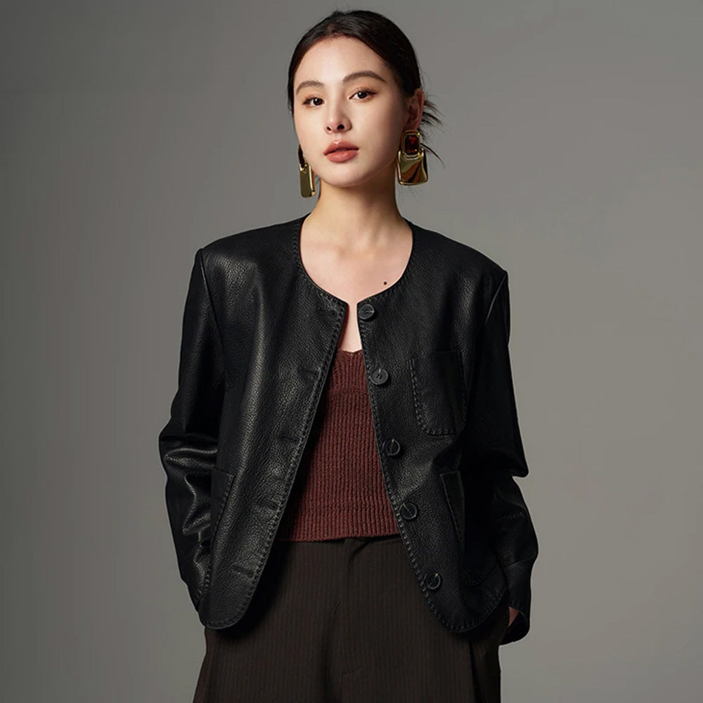 Women's Cropped jacket in drum-milled goatskin leather, shade Calculated Tension. Defined by natural pebbled grain and heavy-gauge double topstitching along the edges. — From Borcelleclothes.