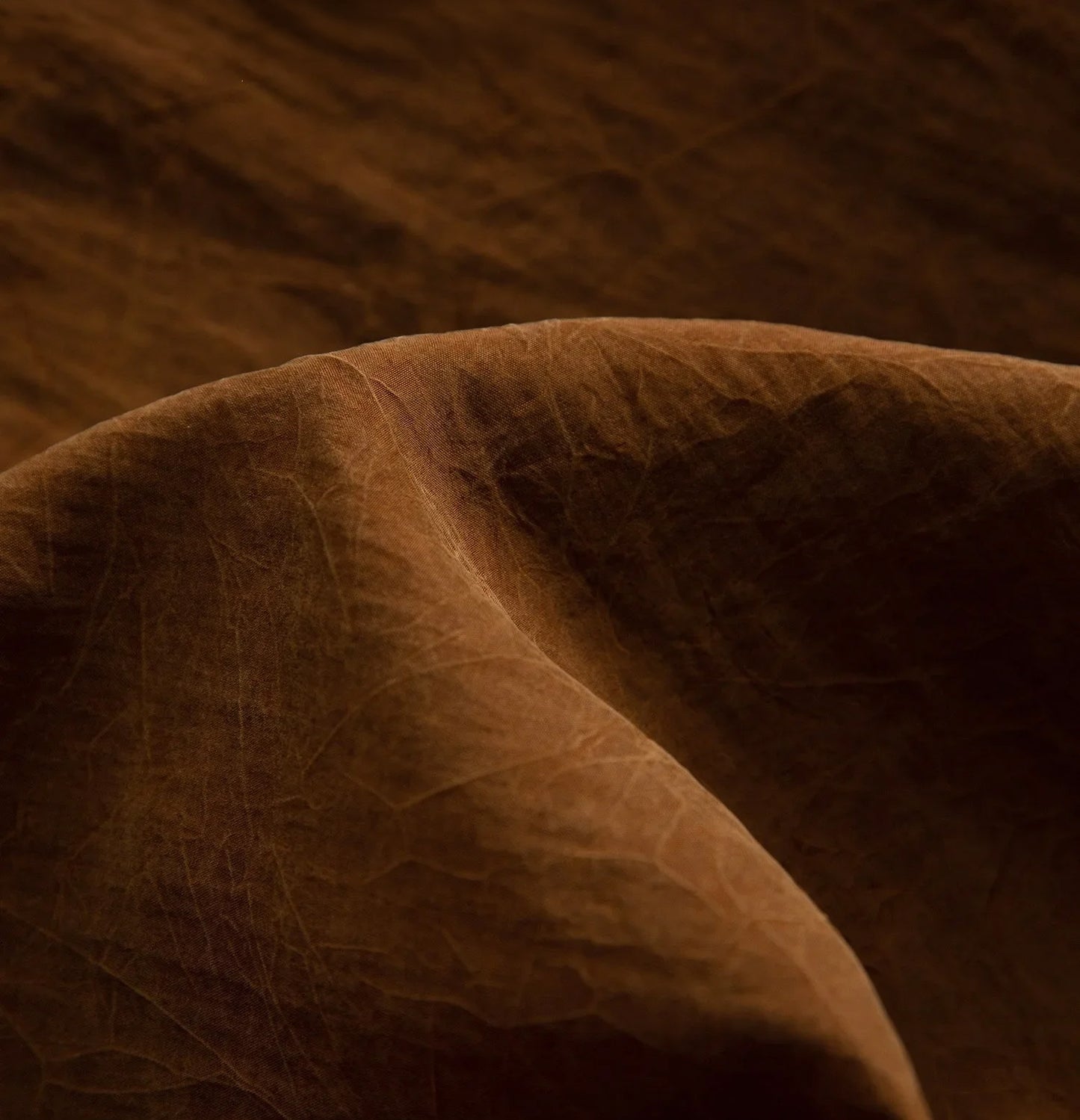 Draped texture of Xiangyunsha Mulberry Silk Blouse in Cinnamon Amulet highlighting soft sheen — From Borcelleclothes.