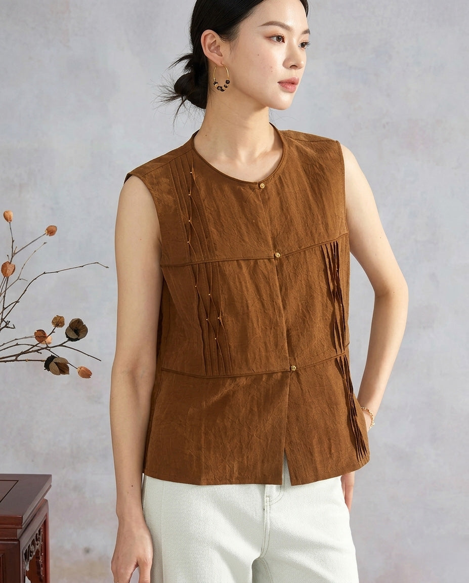 Women’s Tucked Xiangyunsha Mulberry Silk Blouse in Cinnamon Amulet shown on model with hand on hip — From Borcelleclothes.