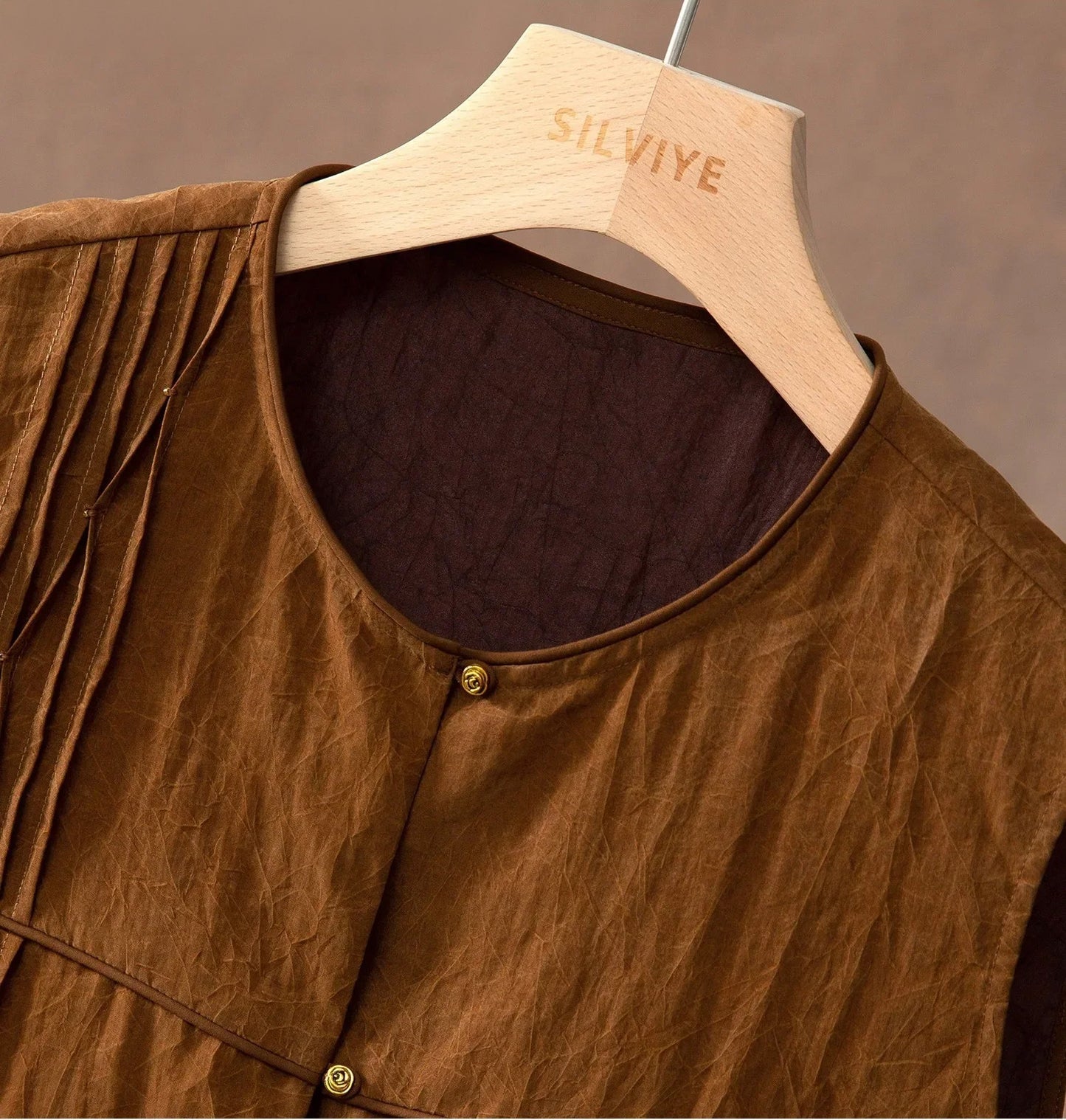 Upper front section of Tucked Xiangyunsha Silk Blouse in Cinnamon Amulet showing collar and top tucks — From Borcelleclothes.