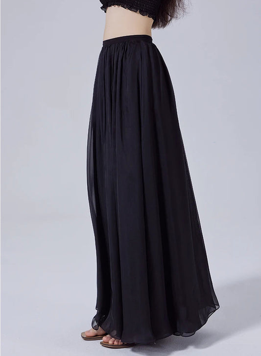 Women's two-layer pleated Mulberry silk chiffon skirt in Ink Dance, side view on model — From Borcelleclothes.