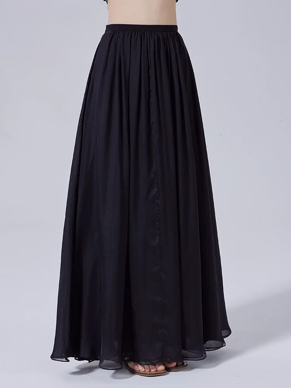 Model turned slightly to the side, wearing two-layer pleated Mulberry silk chiffon maxi skirt — From Borcelleclothes.