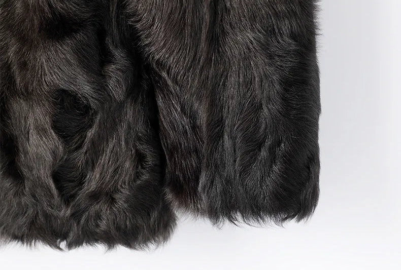 Cuff detail showing the sculpted wool finish on the Henna Glow shearling coat — From Borcelleclothes.