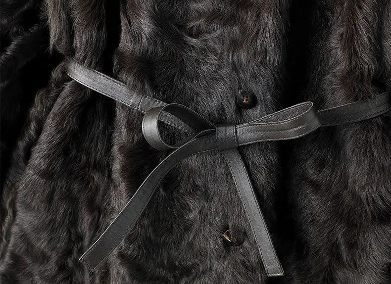 Knotted self-tie belt detail on the Henna Glow V-neckline shearling coat — From Borcelleclothes.