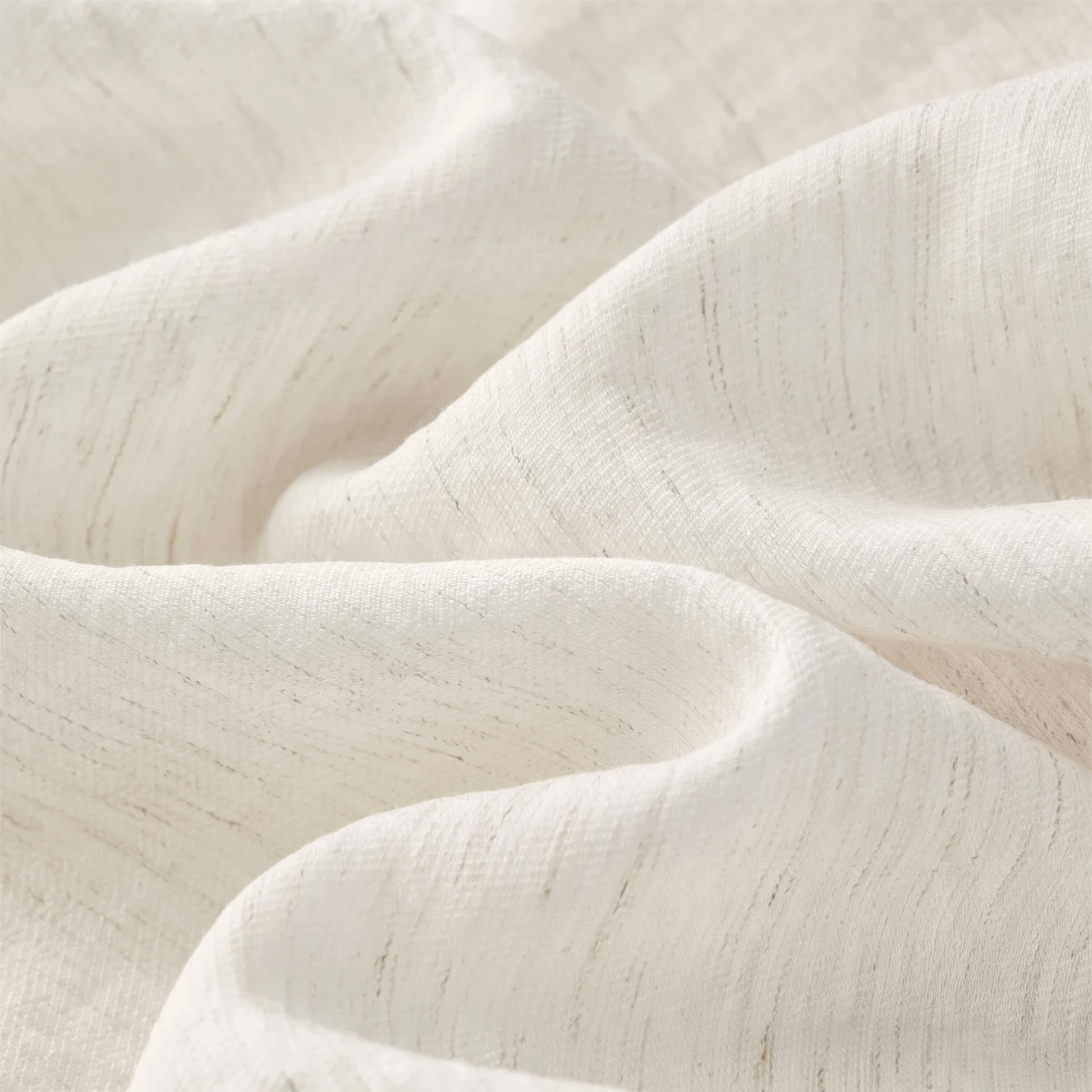 Studio shot of the light, breathable fabric folds showcasing the crinkled texture of the gathered midi skirt in Azir Fog — From Borcelleclothes.